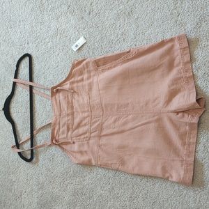 Old Navy utility romper color is a salmon, beige Orange